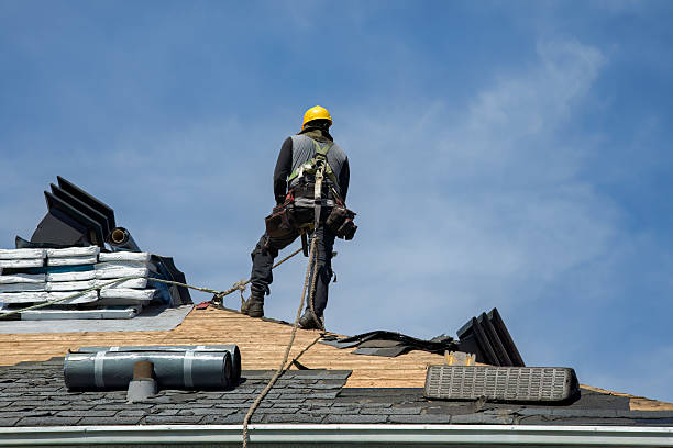 Professional Roof Replacement technician working in Boxford, MA